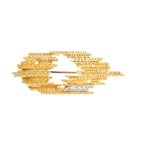 Andrew Grima brooch in textured 18ct gold with lozenge form and three single-cut diamonds, English c.1970