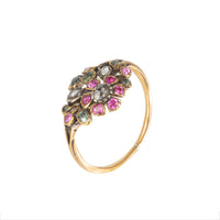 Close-up of Georgian flower motif ring with diamond, emerald, ruby
