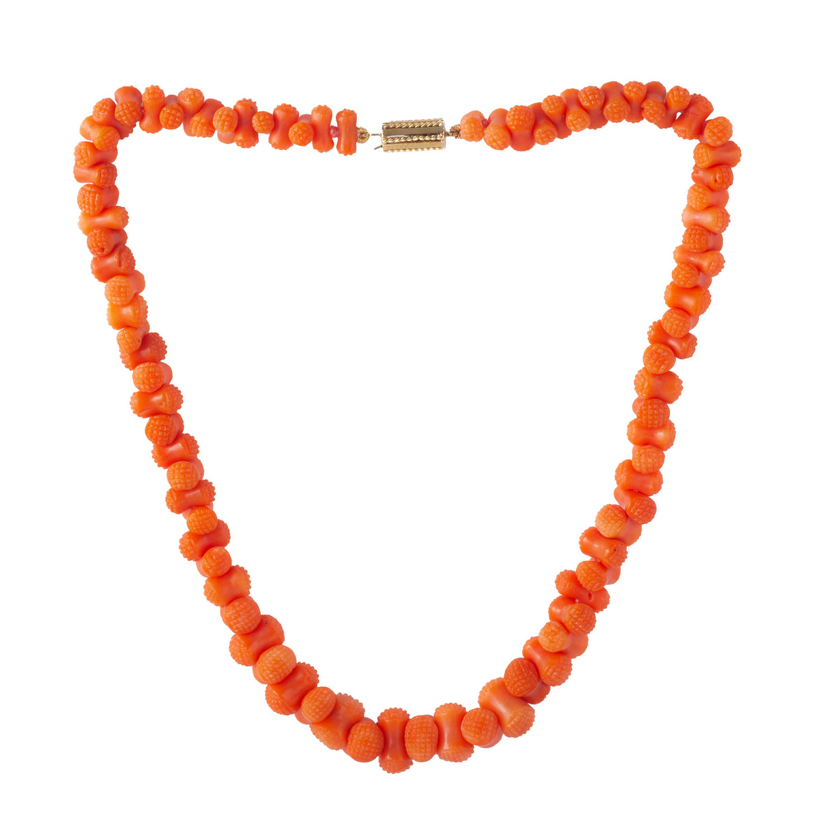 Antique 1880s Italian necklace with hand carved hobnail coral beads and 18ct gold barrel clasp, laid flat.