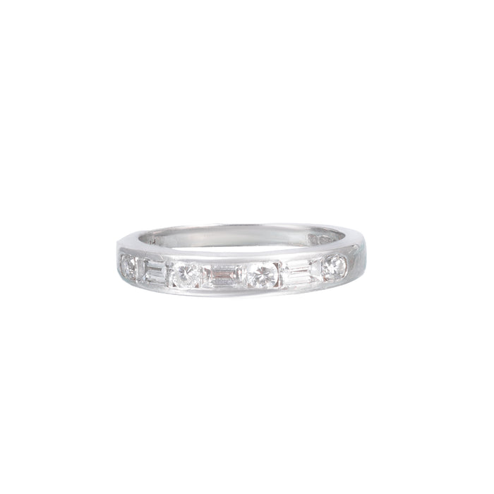 Front view of 1970s 18ct white gold half eternity ring with alternating baguette and brilliant cut diamonds, London hallmarked