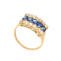 Art Deco sapphire and diamond ring showing side detail and gallery work.