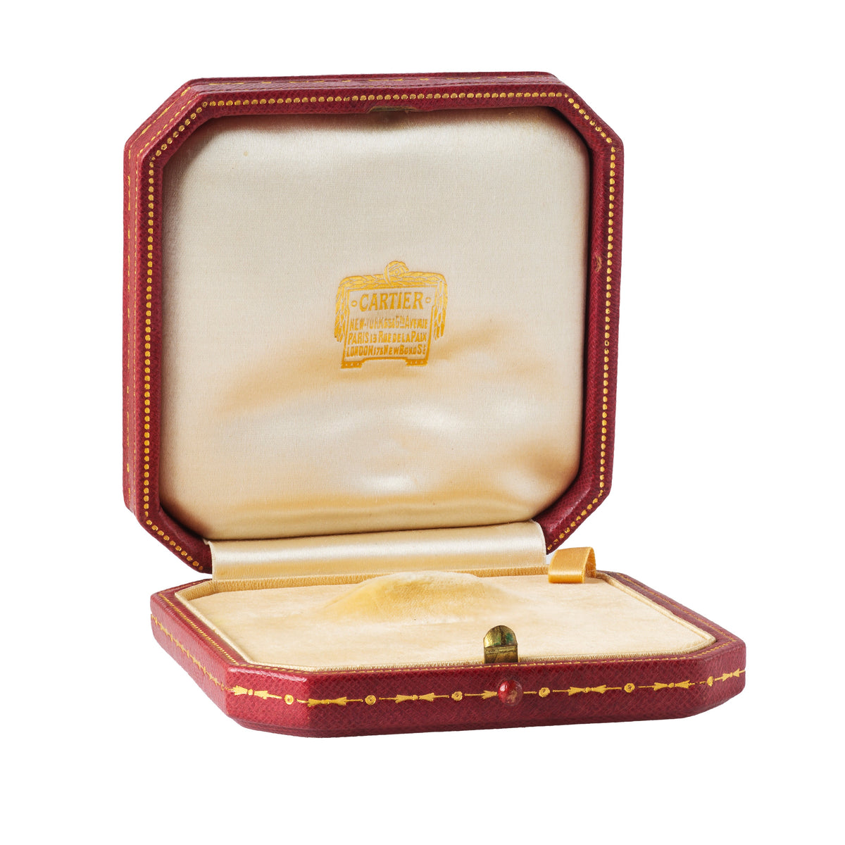 Cartier brooch box in red leather with gold detailing, cream silk and velvet interior, Paris stamp visible.