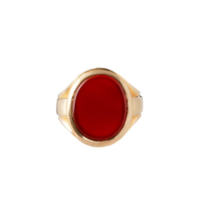 1940s English signet ring in solid 18ct gold with oval flat cut carnelian, front view.