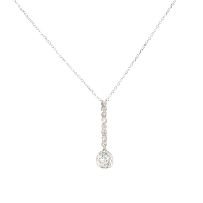 1960s old cut diamond pendant necklace in 18ct white gold with graduated drop design and articulated setting, made in England, 1.4 carats total.