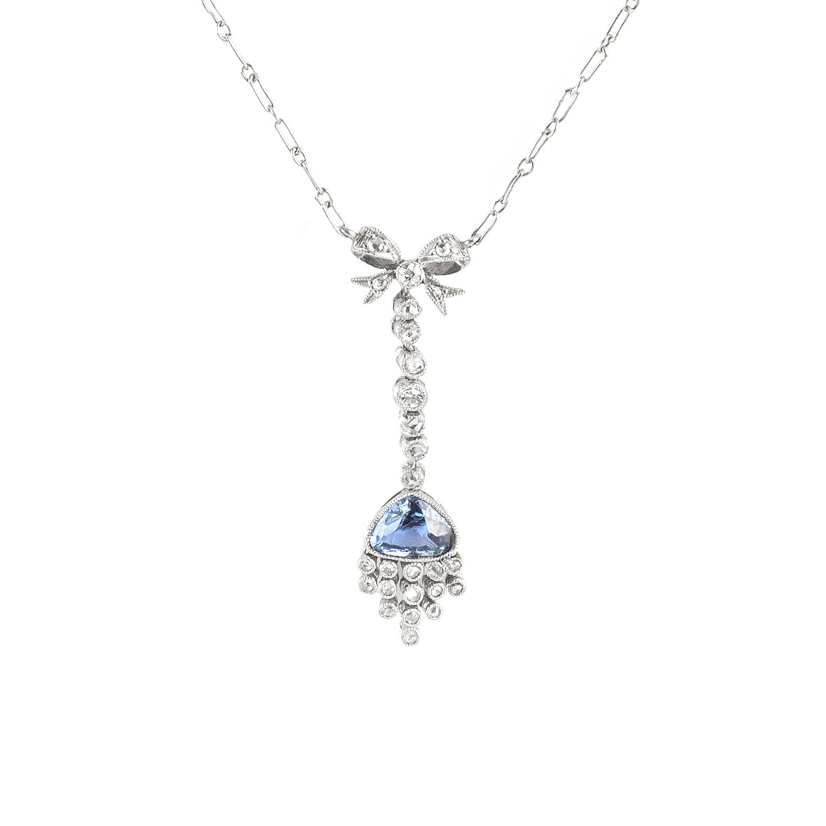 Belle Époque platinum necklace with sapphire and diamond bow design