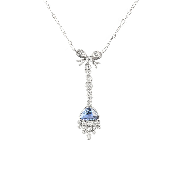 Belle Époque platinum necklace with sapphire and diamond bow design