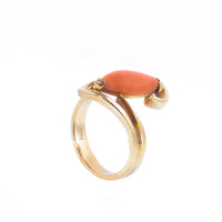 Mid century gold ring with smooth orange coral cabochon, made in Italy.