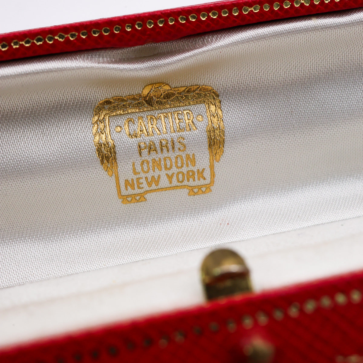 vintage Cartier red leather bracelet box with gold trim, available at  E L T O N S Mayfair