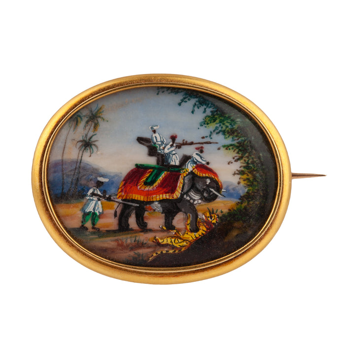 Antique 19th century enamel brooch depicting an elephant and tiger hunting scene, finely painted and set in 18ct gold