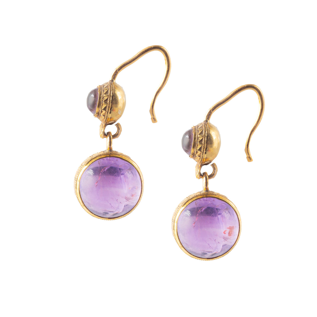 Side view of antique French 18ct gold drop earrings with cabochon amethysts, showing engraved gold band and detailed millegrain work, circa 1880s.