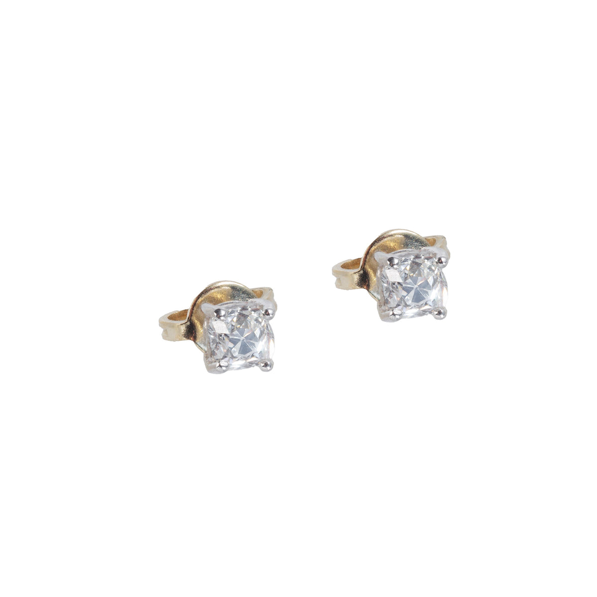 Antique old cut diamond stud earrings in 18ct gold, front view of 0.60ct pair with hand cut stones and butterfly backs