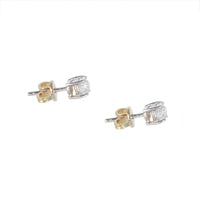 Side view of antique 0.60ct old cut diamond stud earrings in 18ct gold settings, showing profile and butterfly backs