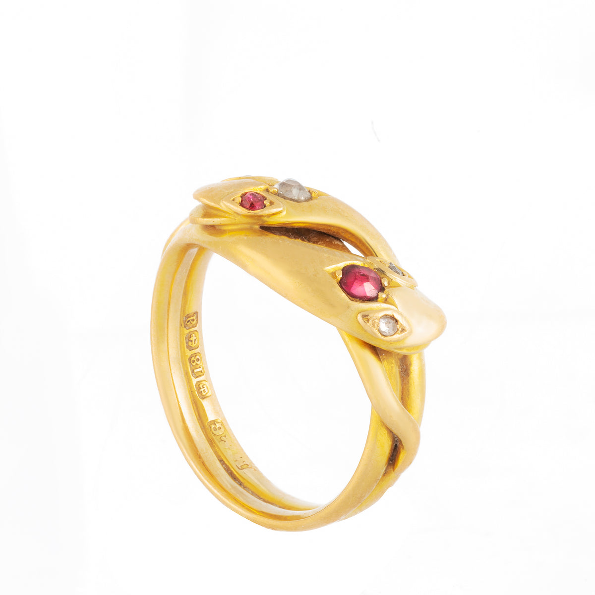 Side view of antique 18ct gold snake ring with entwined serpents, rubies and diamonds.