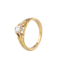 Antique 1920s diamond solitaire ring in 18ct gold with four claw mount, side view