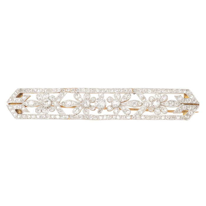 1920s Art Deco brooch with old cut diamonds set in platinum and gold, floral design front view