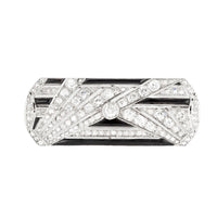 Art Deco diamond and onyx brooch in platinum, front view showing sunburst design, c.1920s