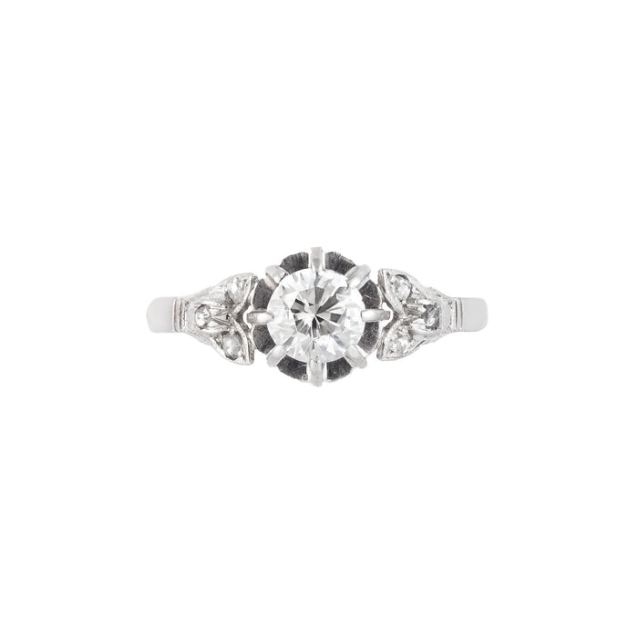 Art Deco old cut diamond platinum ring, c.1920s, featuring a 0.50ct centre diamond with rose cut diamond floral shoulders.
