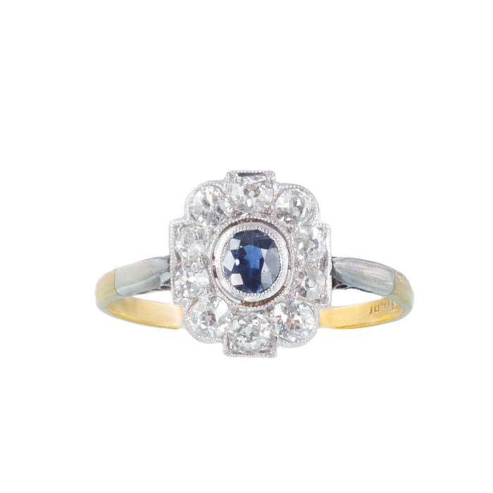 Art Deco sapphire and diamond cluster ring c.1920s, platinum and 18ct gold, with 0.40ct sapphire and 0.75ct old cut diamonds, front view.