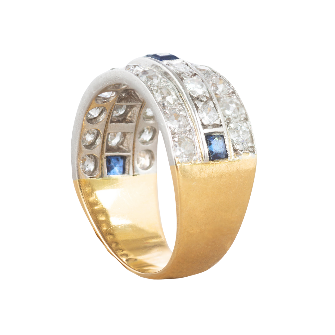 Art Deco ring side angle showing sapphire band framed by diamond rows