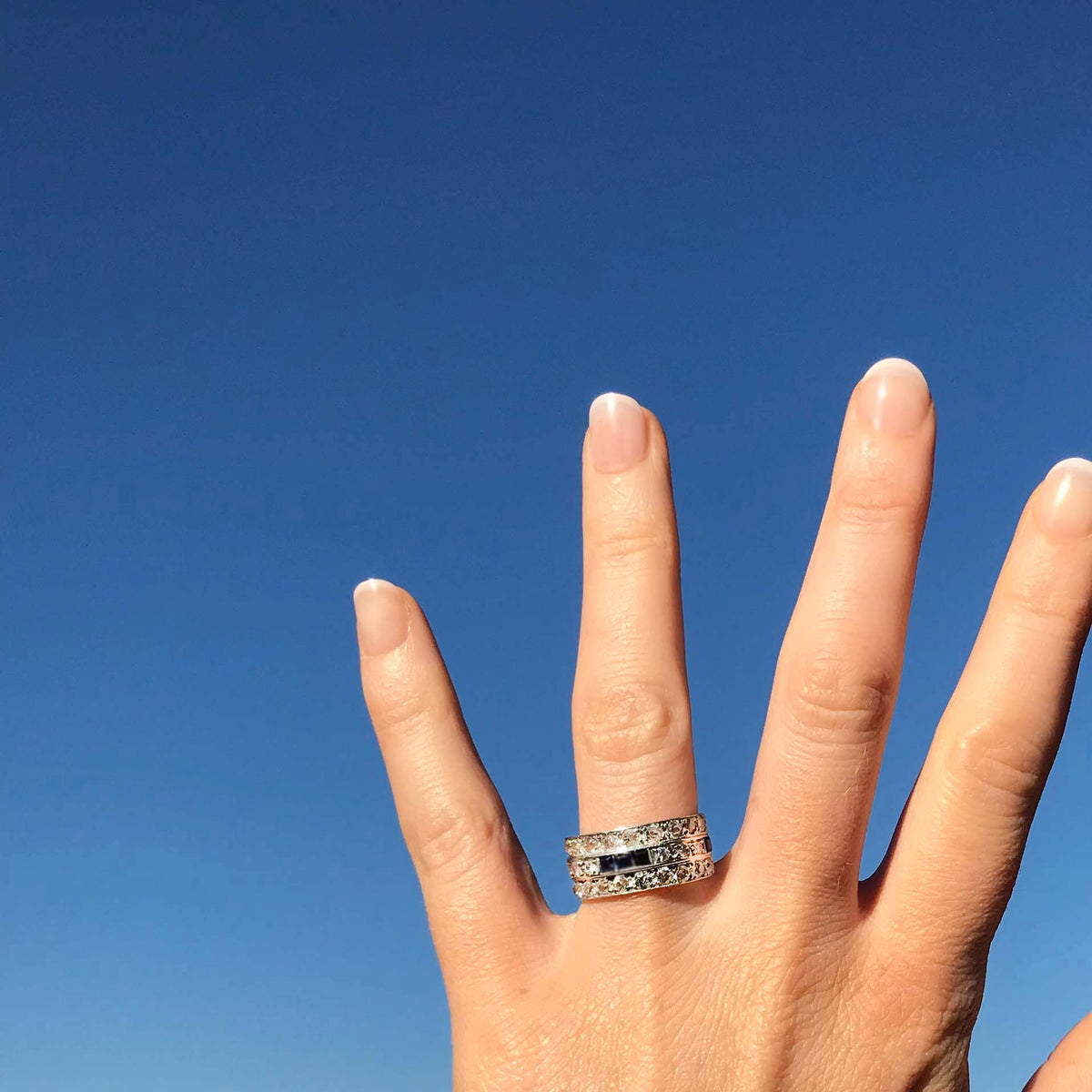 1930s Art Deco diamond and sapphire band ring modelled on hand