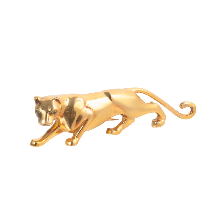 Vintage 1980s Cartier Panthère brooch in 18ct yellow gold with Emerald eyes, getting ready to pounce.