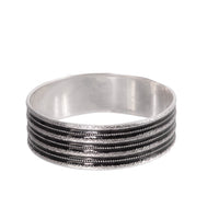 Art Nouveau silver and black enamel bangle by David Andersen, Norway c.1890s, early maker’s mark, 2cm wide