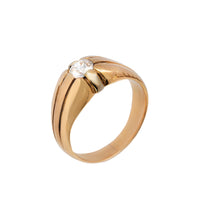 Vintage 1940s English gypsy ring in 18ct gold with flush set cushion cut diamond, broad gold shoulders, side view.