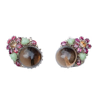 Front view of Dorrie Nossiter Arts and Crafts dress clips in silver with smoky quartz, chalcedony, tourmaline and citrine, English c.1920s