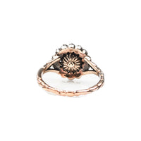 Back of 1820s Dutch rose cut diamond cluster ring showing engraved shoulders and pierced gallery.