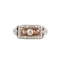 Face of Edwardian diamond ring, c.1910, in 18ct gold with a platinum topped setting, featuring cognac and white old cut diamonds totalling 1.9 carats.