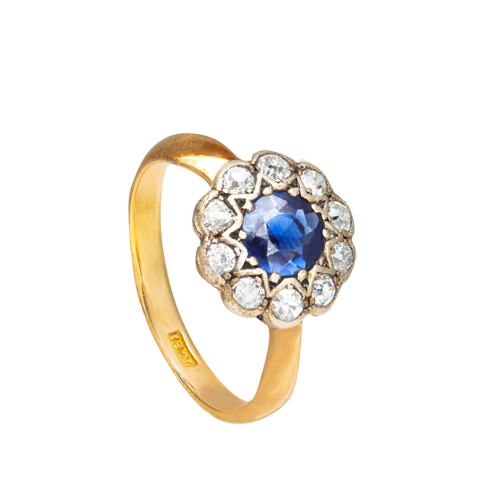 Side profile of Edwardian sapphire and diamond cluster ring showing scalloped gallery and 18ct yellow gold shank