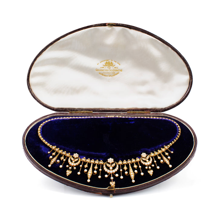 Edwardian seed pearl and 18ct gold necklace in original fitted box, Goldsmiths & Silversmiths Co., c.1905