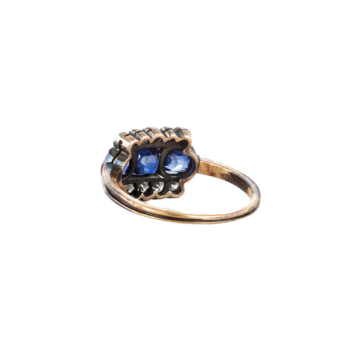 Rear view of 1920s Art Deco sapphire and diamond ring in 18ct gold, showing deep blue Ceylon sapphires and old cut diamond rows in silver topped setting.