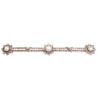 French Belle Époque platinum and gold bar brooch set with pearls and old cut diamonds, circa 1900, by Eltons