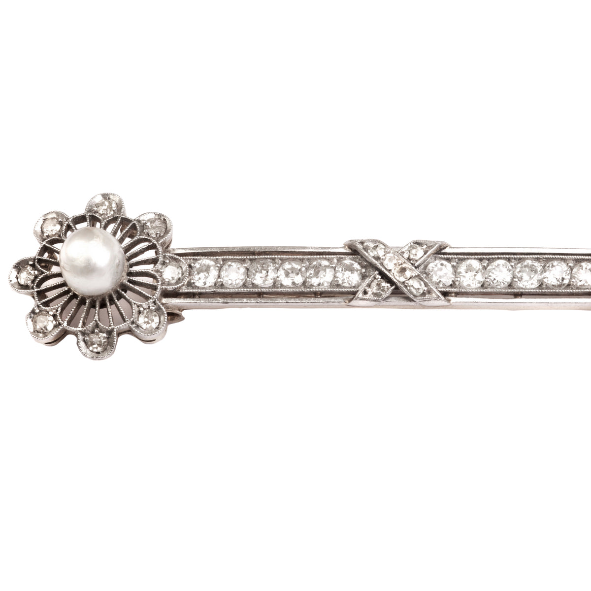 Close up of French Belle Époque brooch showing pearl and old cut diamond floral detail in platinum and gold, circa 1900, ELTONS
