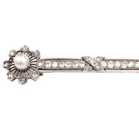 Close up of French Belle Époque brooch showing pearl and old cut diamond floral detail in platinum and gold, circa 1900, ELTONS