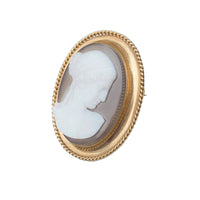 Side profile of a French hardstone cameo brooch c.1860s, highlighting the carved agate portrait and 18ct gold Etruscan Revival rope twist frame.