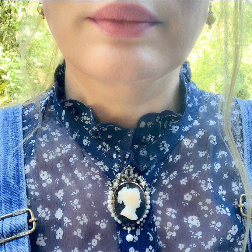 French 18ct gold cameo brooch/pendant c.1860 shown worn, featuring a classical hardstone cameo framed by pearls and diamonds.