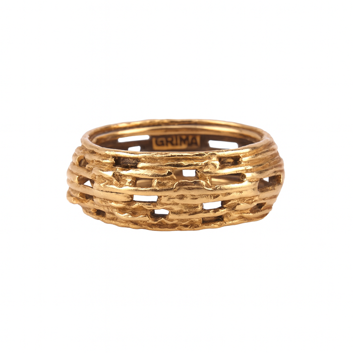 Front view of a vintage 18ct gold textured ring by Andrew Grima, showing the sculptural openwork design characteristic of the 1970s.