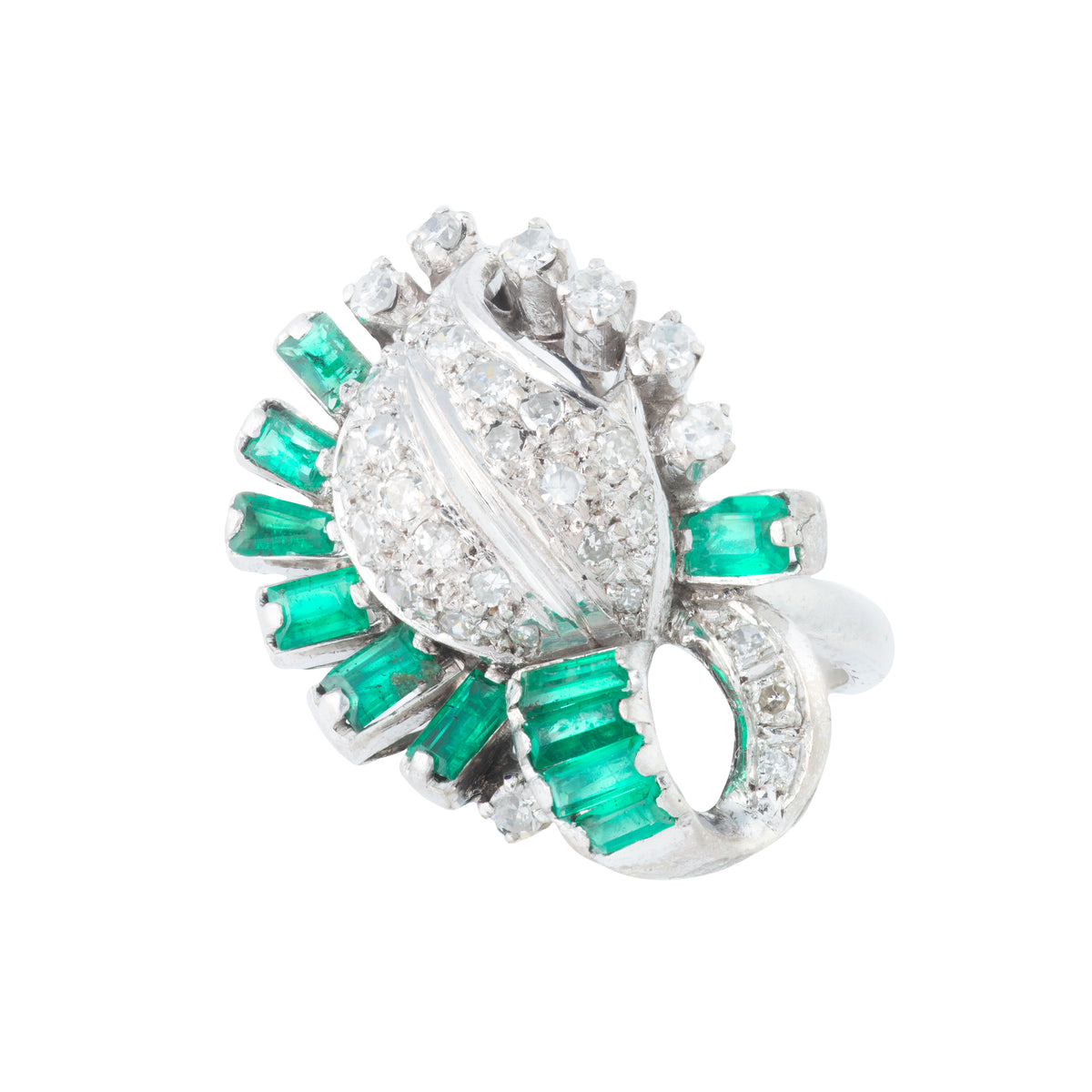1950s Colombian emerald and diamond cocktail ring in platinum, eleven baguette emeralds surrounding pavé diamond leaf, front view.