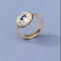 1920s sapphire and diamond ring photographed on finger, showing sparkle and proportion