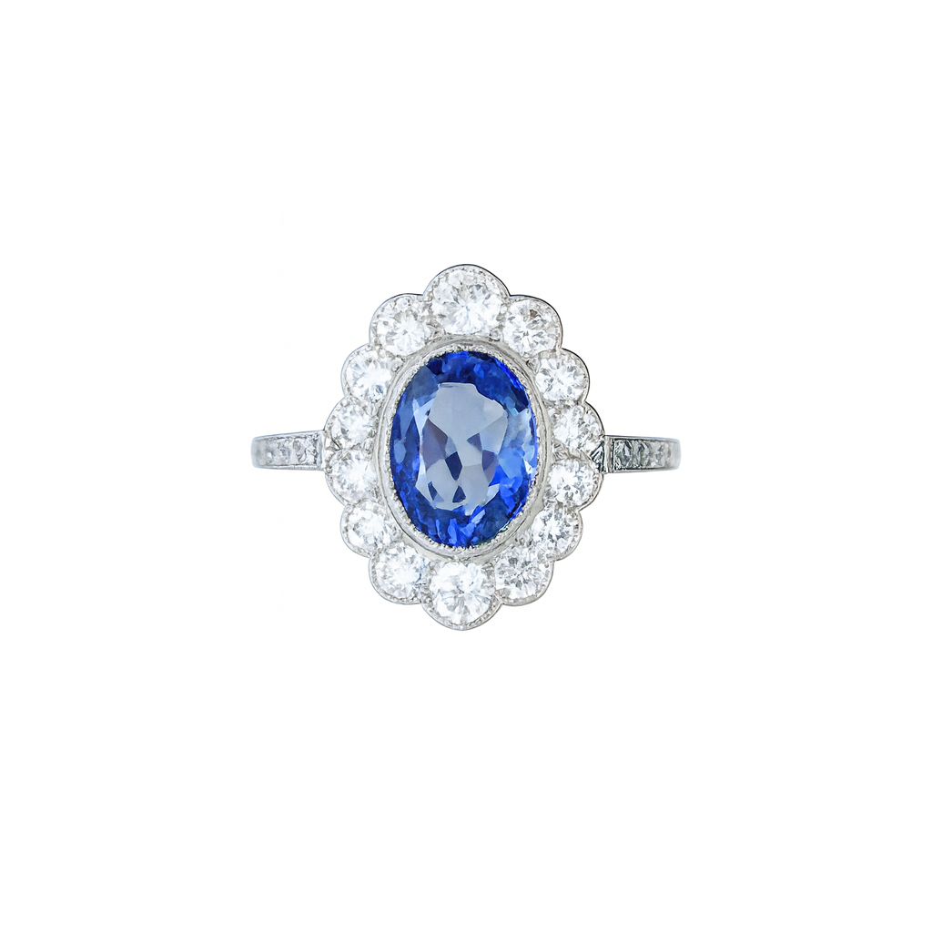 1960s sapphire and diamond cluster ring in 18ct white gold with a Ceylon sapphire and diamond halo, front view