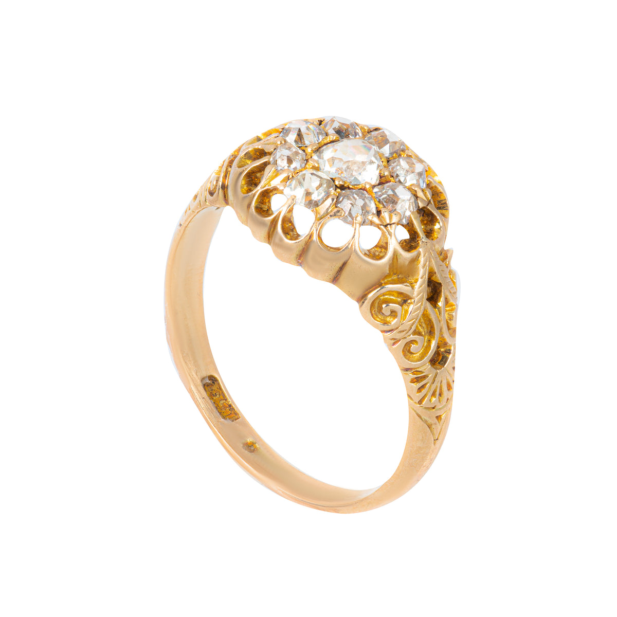 Antique 1880s diamond cluster ring in 15ct scrollwork gold, showing intricate tulip detail on the shoulders