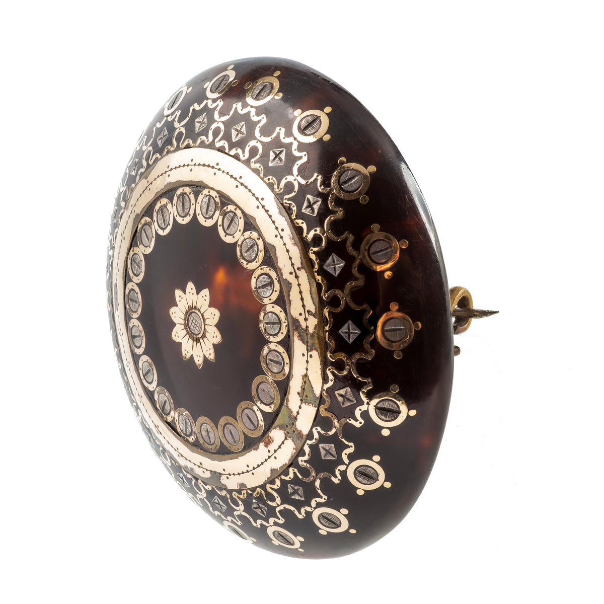 Side view of large Victorian piqué tortoiseshell brooch, showing depth and gold and silver inlay detail, c.1880s.