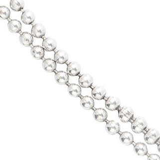 Close up detail of antique Victorian silver ball necklace c.1880s, highlighting the polished silver beads and continuous strand design.