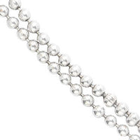 Close up detail of antique Victorian silver ball necklace c.1880s, highlighting the polished silver beads and continuous strand design.