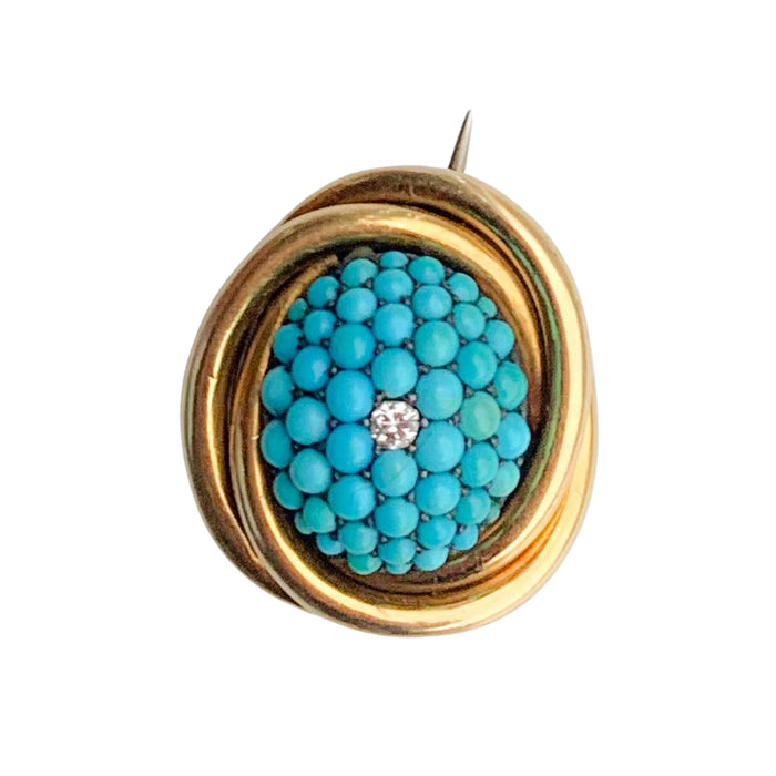Victorian turquoise and diamond brooch in 15ct gold, c.1870, with old cut diamond at centre and pavé turquoise cabochon cluster.