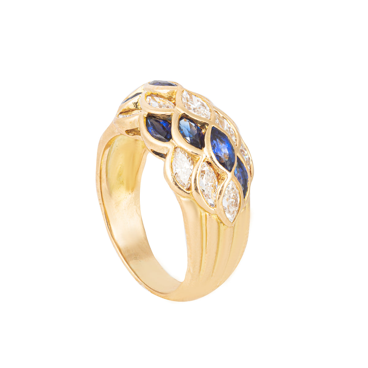 Vintage sapphire and diamond cocktail ring from the 1940s, raised dome setting in 18ct yellow gold with intricate lattice detail.