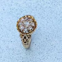 Antique cushion cut and old mine cut diamond cluster ring in 15ct gold, full rotating view on carousel, English c.1880s