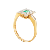 Art Deco emerald engagement ring in platinum and 18ct gold with geometric setting
